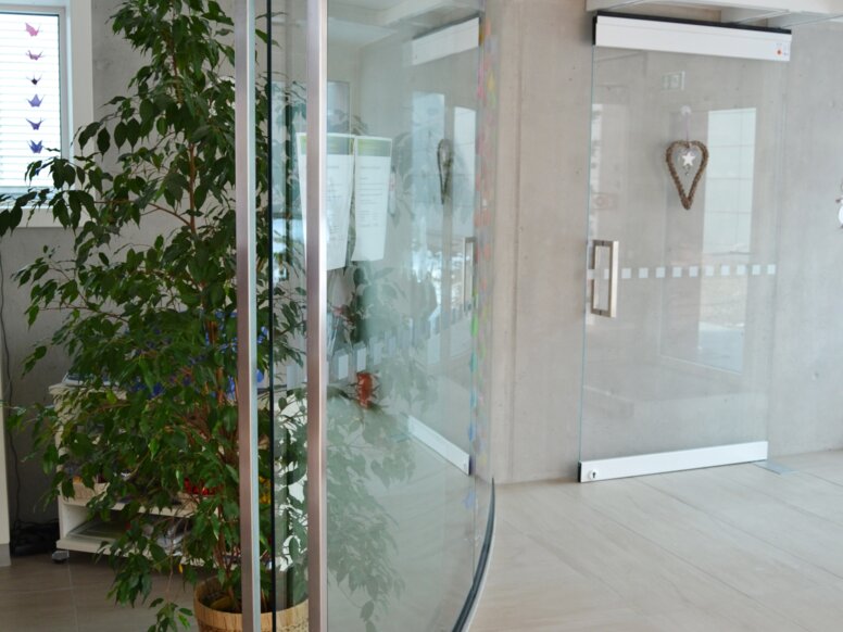 Glass door with handles